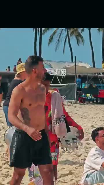 Professor Deivid Dias on the beach in Rio during the tour
