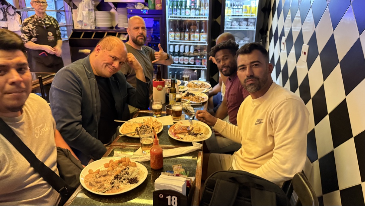 OSS Rio Tour group sharing a table at a restaurant in Rio de Janeiro