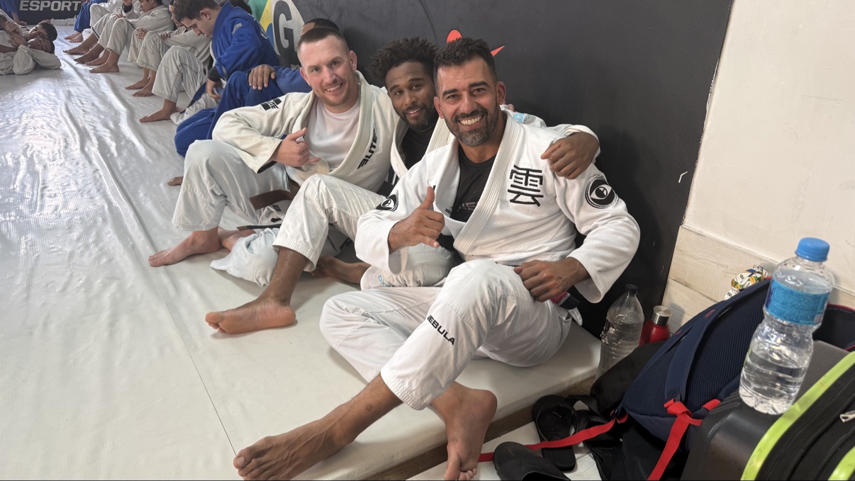 OSS Rio Tour group on the mats at a GFTeam academy in Rio de Janeiro