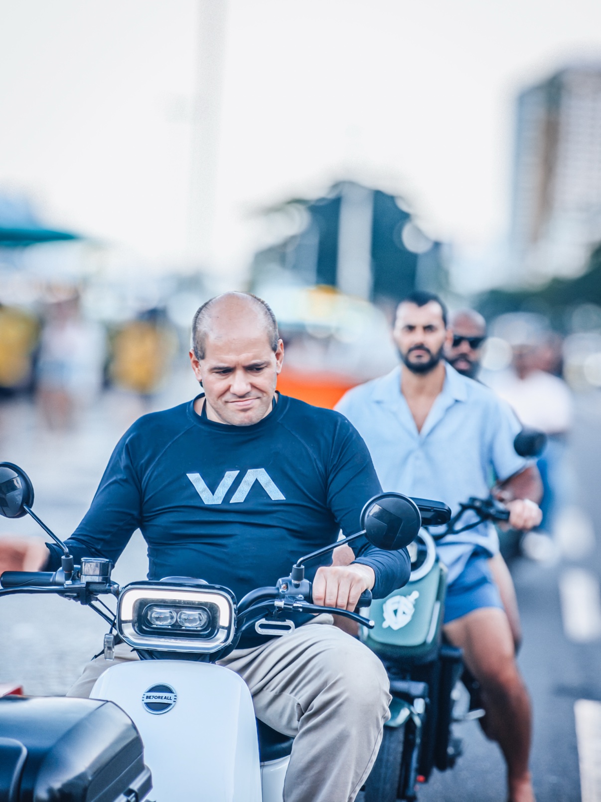OSS Rio Tour member riding a scooter through Rio de Janeiro