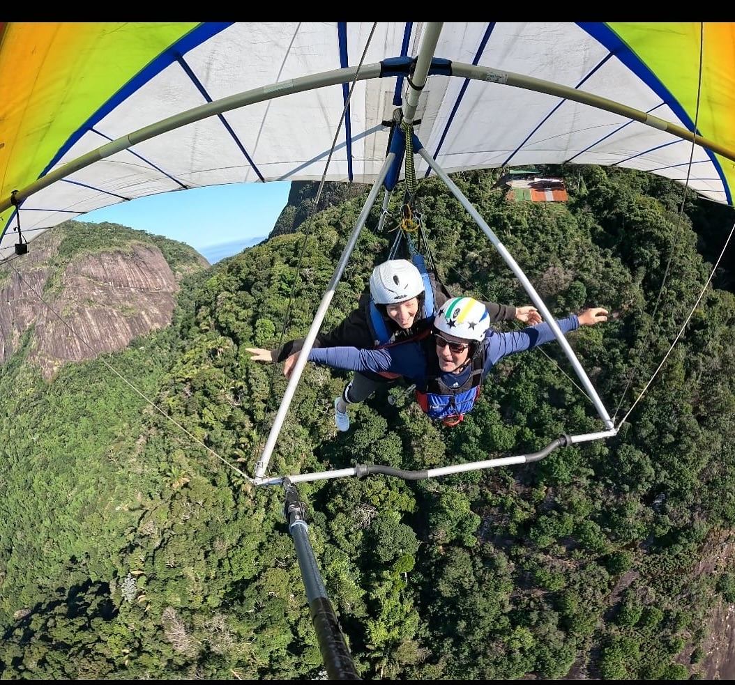 Paragliding over the Rio de Janeiro coastline on an OSS Rio Tour adventure day