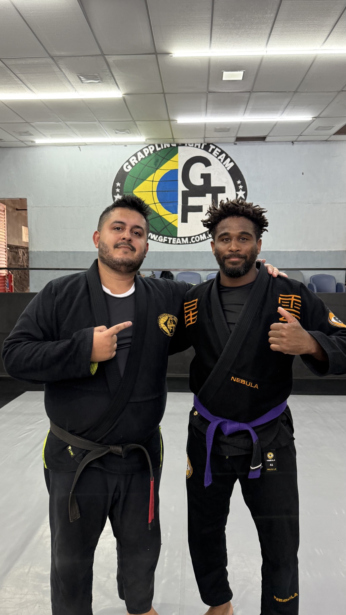 Two GFTeam black belts in black gis in Rio de Janeiro