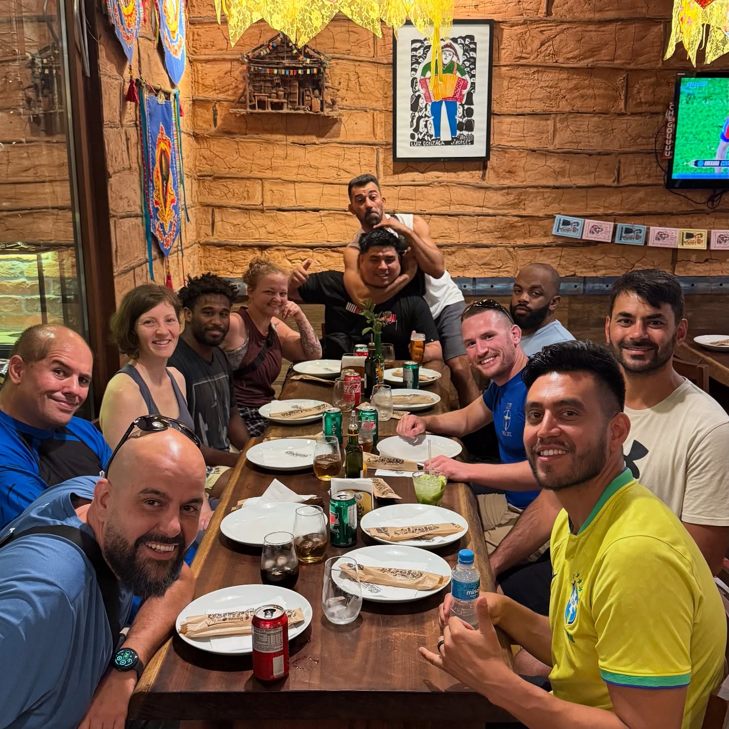 OSS Rio Tour crew sharing a group dinner in Rio